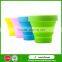 Heat resistant collapsible double wall glass cup with silicone lid