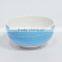 Baby feeding small ceramic rice bowl with colorful painting