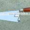 stainless steel bricklaying tools in plaster trowel