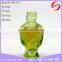 green skull shape glass bottle for perfume