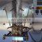 Automatic and high efficiency vertical sauce filling and sealing packing machine