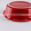 China suppliers kitchen cookware ceramic baking pans with red handle