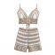 Ensemble de style de vacances pour filles sucrées et épicées, gilet sexy pour femmes avec des motifs de crochet creux et une sangle en col suspendu