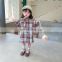 2020 autumn Korean girl literary fan ruffled plaid skirt irregular Hong Kong style shirt