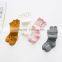 B40520A Low MOQ knee high knitted baby girls carton stockings