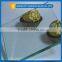 Tinted clear float glass