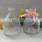 Hanging glass bee catcher with metal handle and wood cork stopper for home and garden use