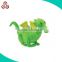 green cute stuffed dinosaur plush animal toy with spots