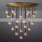 Hot selling China Modern globe Pendant Light Luxury Crystal Led Ceiling Pearl Round Stair Chandeliers for living room