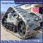 Installing a half chain rail on a tracked chassis harvester to solve the problem of stuck vehicles