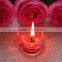 Hand made mouth blown heart shaped clear and red glass candle holder with different color candles