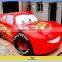 Various Cartoon Cars With Horns Driving By Kids