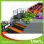 Popular Newest Games Large Indoor Amusement Trampoline Games Park with Foam Pit Basketball and Climbing Wall