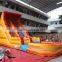 volcano lava themed inflatable water slide with a bigger water pool
