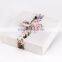 Red christmas ribbon bow with adhesive tape