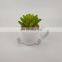indoor ceramic plant pot with fake indoor artifical plants outdoor