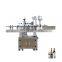 Automatic winding labeling machine for bottled products such as plastic glass