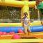 Wholesale bounce houses child climbing into the giant circus bounce house