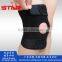 Compression neoprene knee support with adjustable spring support and compression silicon pad