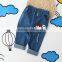 Do the old hole cartoon cow embroidery denim trousers