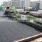 spray coating system running track pave machines