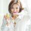 Woman fashion long bell sleeve white color bow front loose chiffon blouse