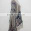 Ladies elegant multi color knitted cardigan with fringes