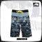 Lily flower print with reflective logo surf shorts