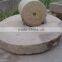 antique millstone roller