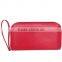 Fashional women's wallets made in red PU with strap.