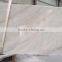 Polished cheap Chinese Guangxi white marble slab with red veins