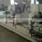 Double heads mitre saw cutting machine with Cutting length 435-4200mm and conveyor with feeding roller