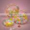 Cylinder shaped clear containers with slip over lids sized to hold gumballs