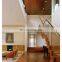 Single stringer staircase steps with glass railing for living room