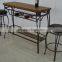 metal bar table and stools with wood table top leather stool cushion