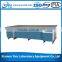 Steel frame laboratory work bench with sink and reagent shelf