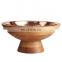 wooden bowl with copper bowl inside