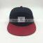 wholesale custom design your own logo 7 panel black snapback hat with woven label