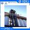 Vertical lifting bucket elevator for material handling