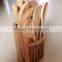 wooden knife block with three wooden utensils, four knives and 1chopping board