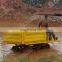 Mountain orchard self-unloading hand-held engineering small track transport vehicle