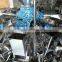 Electronic weighing bean packaging machine