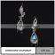 Simple gold earring designs for women with big diamond earring