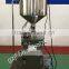 Vertical type constant temperature liquid wax filling machine with mixer and hopper