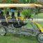 Public renting 4 person quadricycle tandem bike