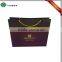 Custom fashionable shopping paper bag with silver foiled logo print