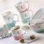 New design embossed wholesale porcelain promotional mug