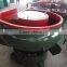 Vibratory finishing machine with separator