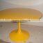 living room Eero Saarinen fiberglass tulip table