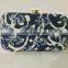 Sequence embroidery designer clutch